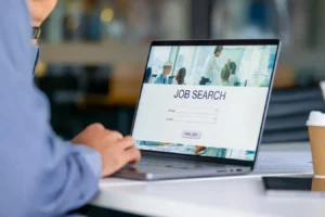 Job change alerts routed to a sales rep with a champion's new company highlighted
